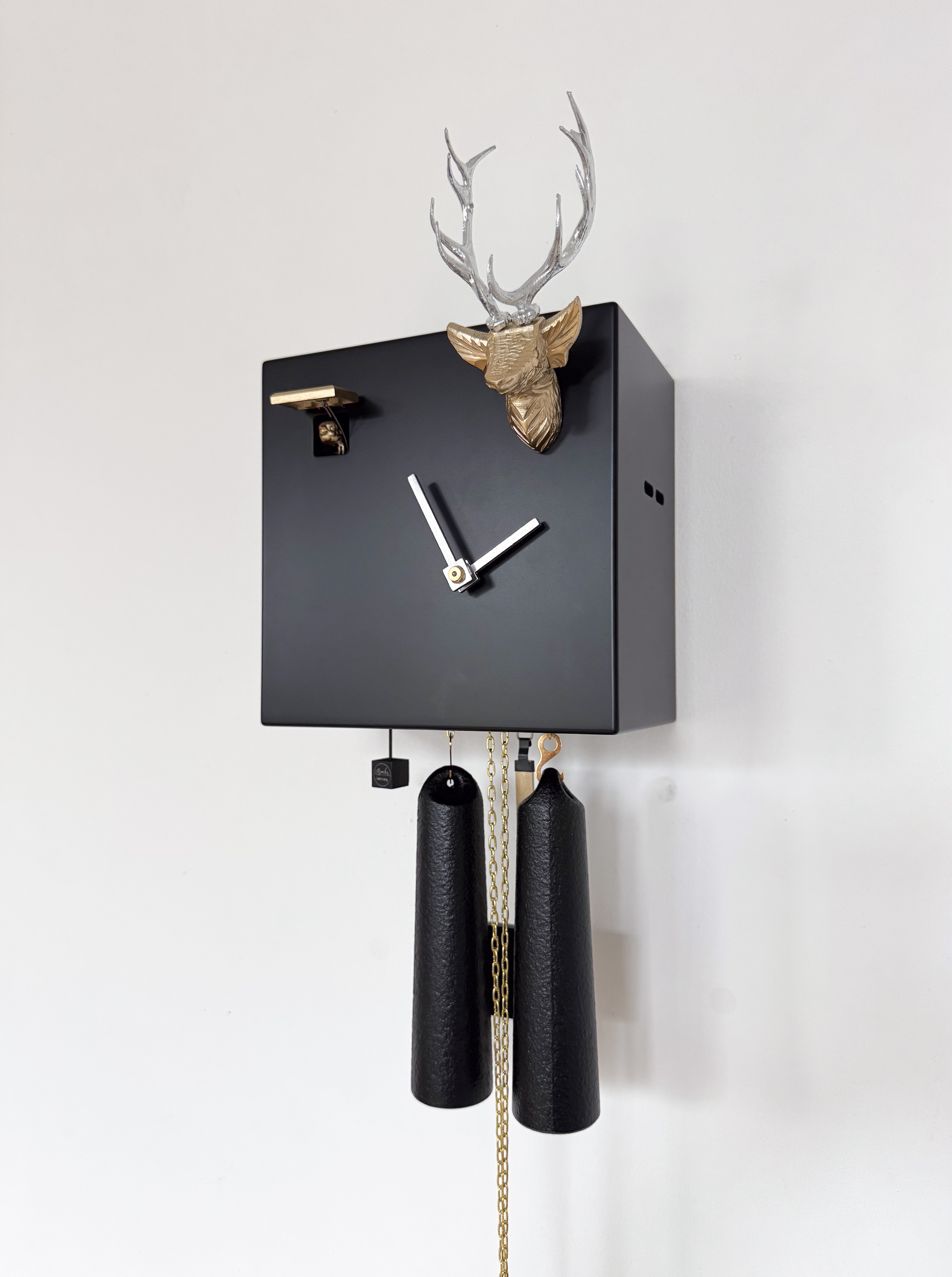 KUBUS - Design Kuckucksuhr (schwarz) mit Hirschkopf Rombach & Haas 